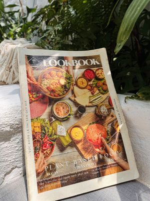 Magazine-style menu  at iVegan Supershop Da Nang - Healthy Plant Based Cafe in Da Nang