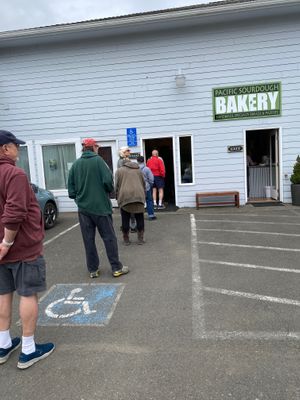 Long fairly fast line of friendly folks. No seating. Nice view across the street to enjoy while waiting  at Pacific Sourdough in Waldport
