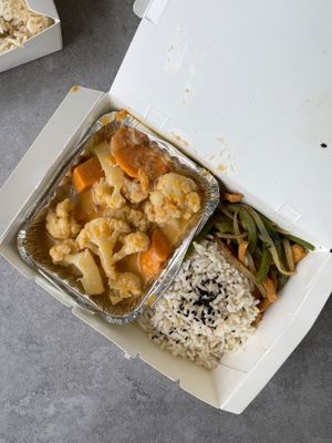 Manhattan Curry
Sweet potato red curry with cauliflower florets, served with sauteed shredded potato with crispy tofu and brown rice
 at Savor of Life in Kuala Lumpur