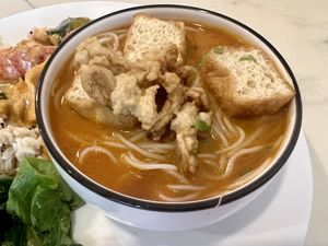 Sarawak laksa (half of it)   at Savor of Life in Kuala Lumpur