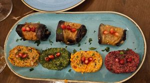 Aubergine rolls and pkhali selection (walnut paste with beans, spinach, carrot & beetroot) at Kartuli in South East London