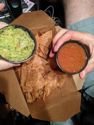Guac and chips appetizer at Medici On 57th in Chicago