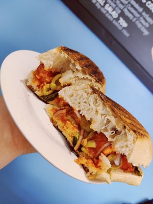 Pizza Panini, vegan meatballs in marinara, olives, onion, basil and sundried tomatoes at Sandwich Heaven in Macclesfield