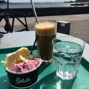 Oat latte & vegan ice cream. at Café Ursula in Helsinki