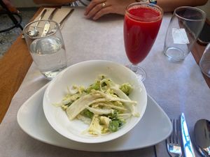 Cabbage Celery & Fennel Salad & Orange Beet & Turmeric juice at Ca n'Ela Vegan Restaurant in Mallorca