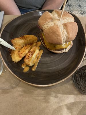 Burger with potatoes   at Ca n'Ela Vegan Restaurant in Mallorca