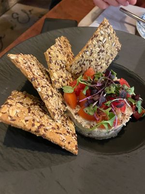 Smoked aubergine tartare with seedy crackers at Ca n'Ela Vegan Restaurant in Mallorca