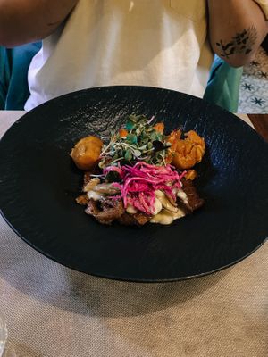 Homemade seitan with vegetables. at Ca n'Ela Vegan Restaurant in Mallorca