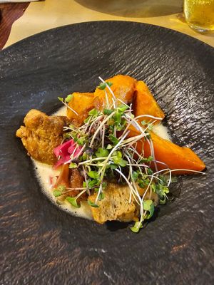 Main course: Saitan with sweet potato and lemon cream sauce. at Ca n'Ela Vegan Restaurant in Mallorca