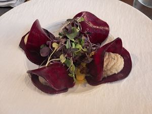 Beetroot "ravioli" stuffed with cashew nut cream with walnuts and capers. at Ca n'Ela Vegan Restaurant in Mallorca