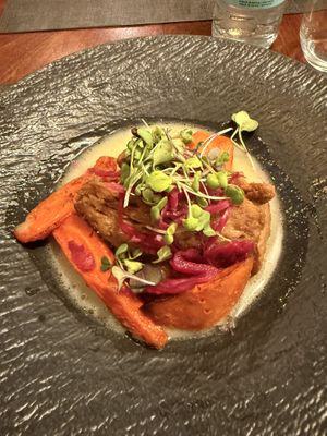 Seitan main dish with carrots and lemon saucee  at Ca n'Ela Vegan Restaurant in Mallorca