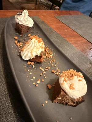 Three bite desert - brownie, carrot cake, Kinder  at Ca n'Ela Vegan Restaurant in Mallorca