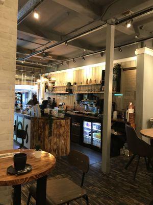 We’re sat in the middle section, view towards the front counter  at Nomas in Macclesfield