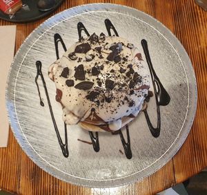 CHOCOHOLIC PANCAKES (Ve)
chocolate sauce, hazelnut praline, bueno spread and oreo at Nomas in Macclesfield