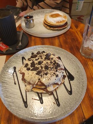 (Top) ORIGINAL PANCAKES
(Ve)
with maple syrup and butter. (Bottom) CHOCOHOLIC PANCAKES. at Nomas in Macclesfield