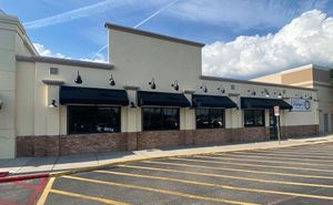 Outside of the Crossings Siesta Key Mall entrance into Palmers Nutritious You Plant Based Cafe at Palmer's Nutritious You in Sarasota