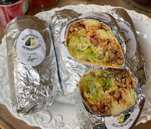 Vegan burritos happy together. at Burritos Hermanos in Paris