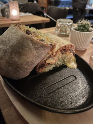 Vegetarian Burrito served on a hot plate   at Burritos Hermanos in Paris