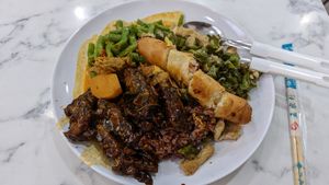 Chose brown rice, two vegetables, two mock meats and curry sauce at Veggie 素食 121 in Central Singapore