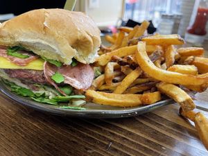 Vegan bacon burger with fries  at Root and Press in Worcester
