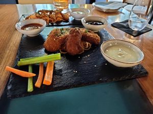 'Wings' with 3 types of dipping sauces: chilli, BBQ, and mayo. at Samadhi in San Jose