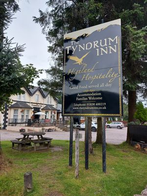 Outside with contact details at The Tyndrum Inn in Crianlarich