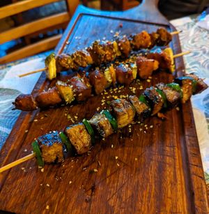 Fish, meat and sausage skewers at A Coruja in Sao Paulo