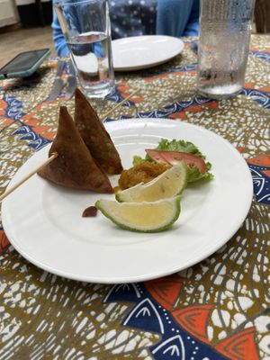 Vegetable samosas after eating two!  at More Than A Drop in Moshi