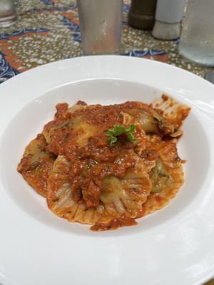 Spinach ravioli with Aribiatta saucee  at More Than A Drop in Moshi