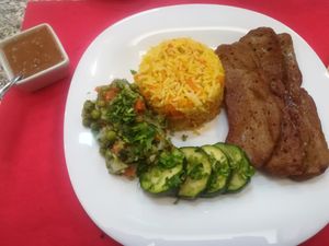 Seitan house steak with rice and veggies at Lanchonete A Casa in Barreiro