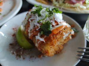 The elote is actually a small dressed up corn on the cob at Casa Del Vegano in Dallas