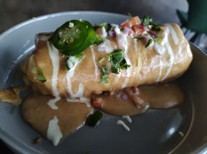 Chicken and rice chimichanga is too good to be described with words. Get it. at Casa Del Vegano in Dallas