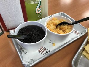 Black beans and Mexican rice  at TACO NACO KC in Overland Park