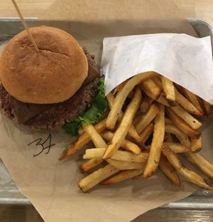 California Dream Burger from the Plant-Based menu. Lots of melty cheese. Vegan bacon added a smoky flavor. at Burger Burger in Bloomington