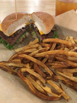 Vegan "Over the Shroom" burger. The caramelized mushrooms made the basic Impossible patty much better. Only half the fries were edible (the rest were either over or under cooked). at Burger Burger in Bloomington