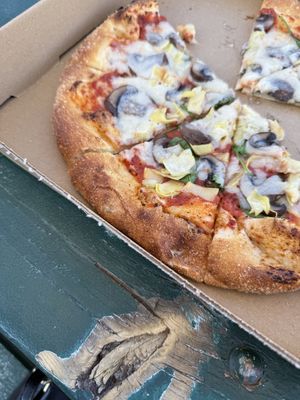 Vegan pizza with artichoke mushroom and spinach   at Mancos Brewing Company in Mancos