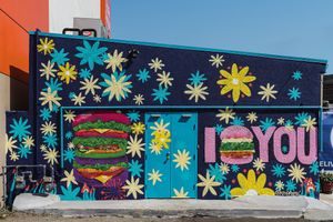 Mural outside of the alleyway pick-up location. at Flower Burger in Los Angeles