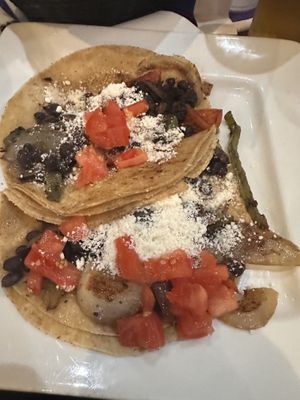 Vegan black bean + veggie fajitas with daiya cheez   at Salty Iguana in Olathe