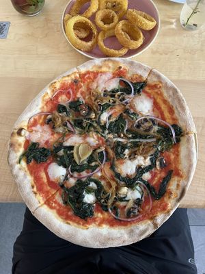 Spinach pizza + onion rings   at Chutnej in Prague