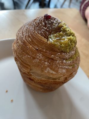 Pistachio ‘doughnut’ which was flaky pasty and filled with pistachio cream 😋 made by their sister company Krafin   at Chutnej in Prague