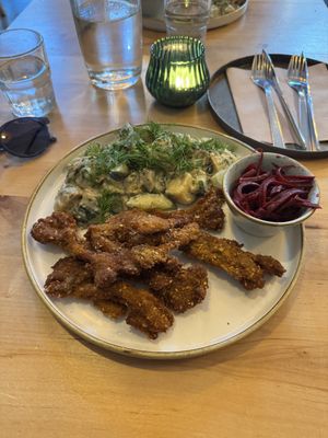 Oyster mushroom strips with cold potato-cucumber salad, side of pickled beetroot  at Chutnej in Prague