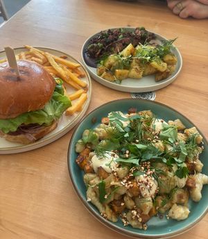 House burger and fries, Lions mane steak and potatoes and the Czech “gnocchi”.   at Chutnej in Prague