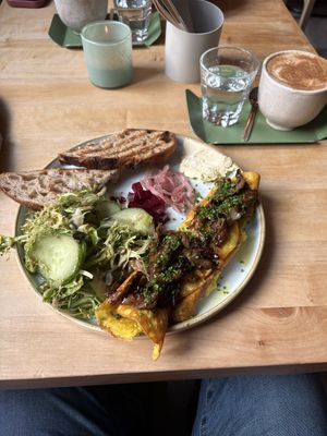 Vegan mushroom omelette and pumpkin spice latte  at Chutnej in Prague
