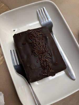 Vegancitos (chocolate coated jam and cream sponge cake)  at El Vegan in Santiago