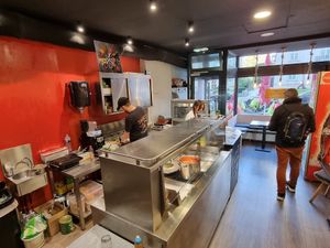 Downstairs, counter/kitchen and few seating at Reed in Luxembourg City