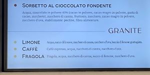  Chocolate fondente sorbet alongside the usual vegan option of granite.  at Gusto Caruso in Polignano A Mare