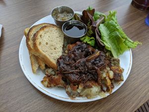 Vegan trio - sourdough toast with rhubarb butter, mixed greens salad and breakfast potatoes with caramelized onions at Short Stack Eatery in Madison