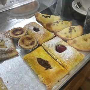selection of vegan pastries on the counter   at AllVeggie in Alverca Do Ribatejo