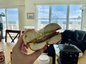 They were out of JUST egg but I got beyond sausage, vegan cheese, tomato and Avocado on an onion bagel. Loved it. Went during off season. Service was quick and staff was friendly.  at Lighthouse Bagels in Corolla