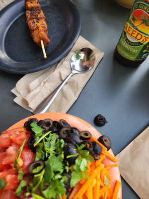 Jazzy bowl sub sour cream and cheese for red cabbage and carrots (very yummy) and bbq tofu skewer (meh) at Cafe Yumm! - Old Mill District in Bend